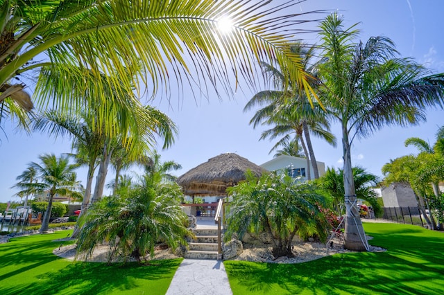 exterior space featuring a gazebo, a mountain view, and a front yard