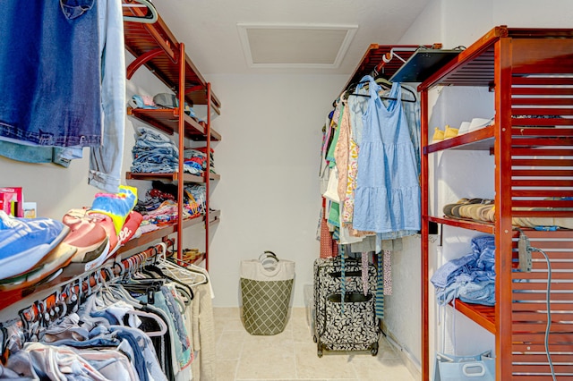 walk in closet with attic access