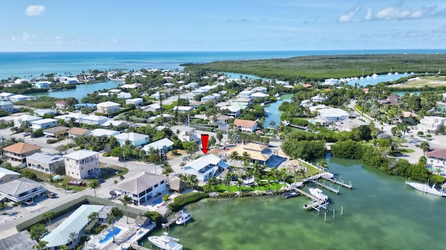 aerial view with a water view and a residential view