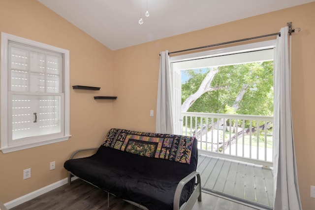 sitting room featuring plenty of natural light, hardwood / wood-style floors, and lofted ceiling