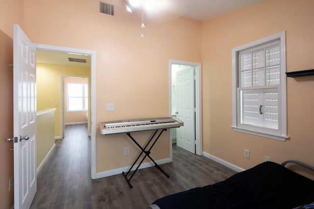 bedroom featuring dark wood-type flooring