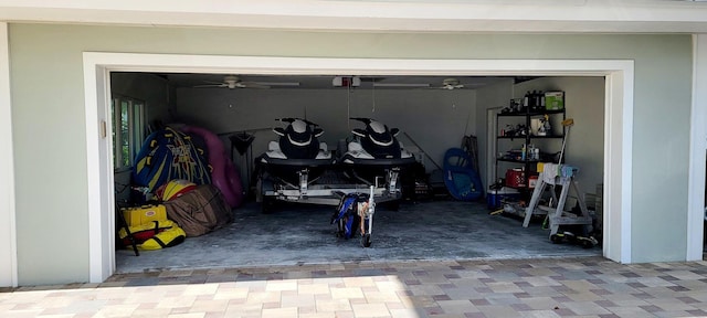 garage featuring a ceiling fan