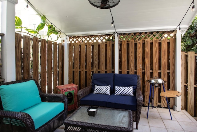 view of patio with fence and an outdoor living space