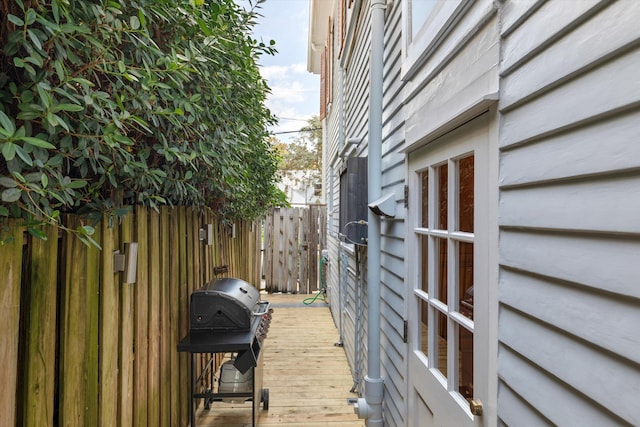 view of side of property with fence