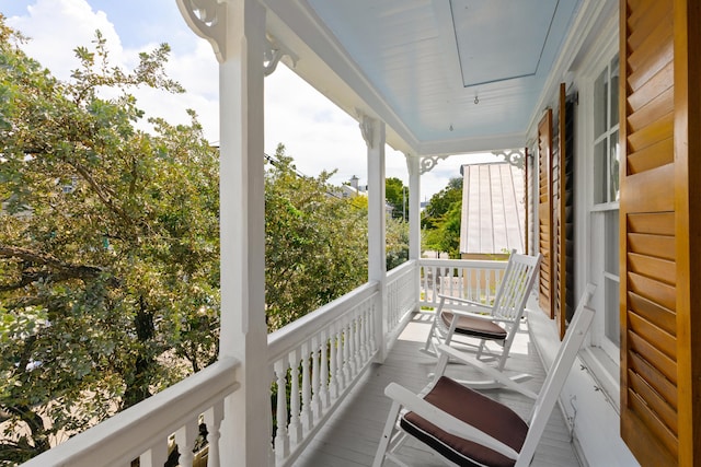 balcony featuring a porch