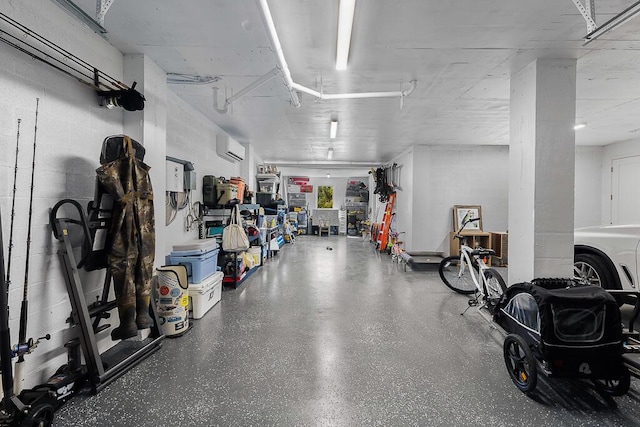 garage featuring an AC wall unit