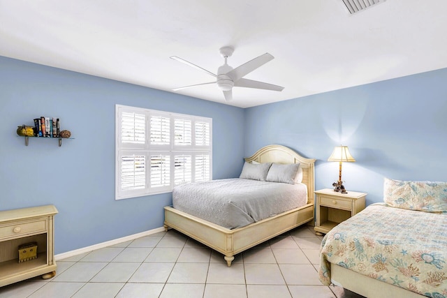 bedroom featuring light tile patterned floors and ceiling fan