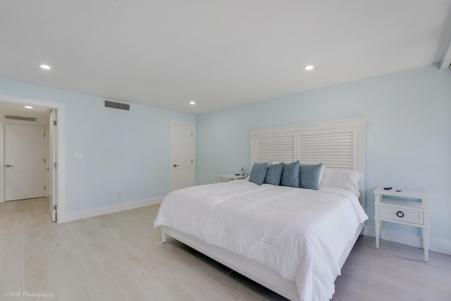 bedroom with light hardwood / wood-style flooring