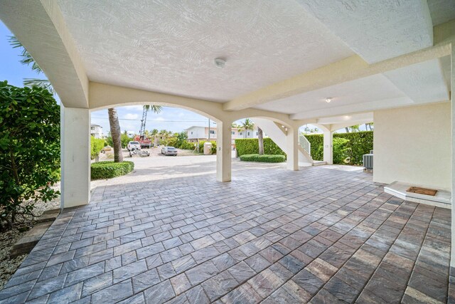 view of patio with central AC unit