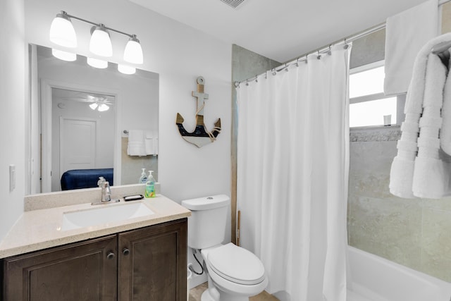 full bathroom with vanity, toilet, shower / bath combination with curtain, a ceiling fan, and visible vents