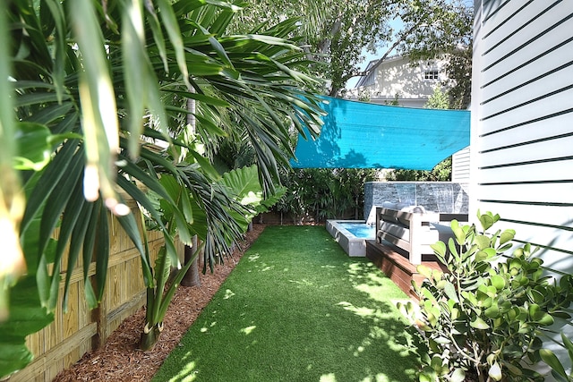 view of yard featuring a fenced backyard
