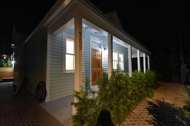 view of property exterior at twilight