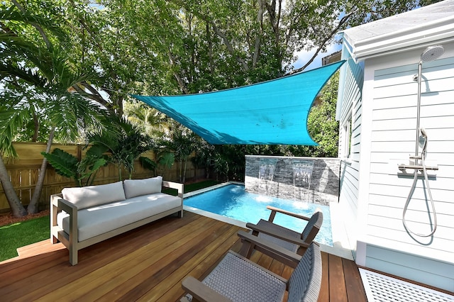 view of pool with a deck, a fenced in pool, an outdoor hangout area, and a fenced backyard