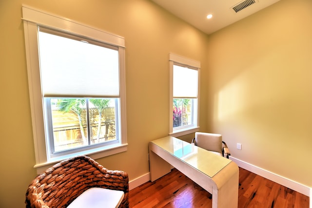 home office with recessed lighting, baseboards, visible vents, and wood finished floors