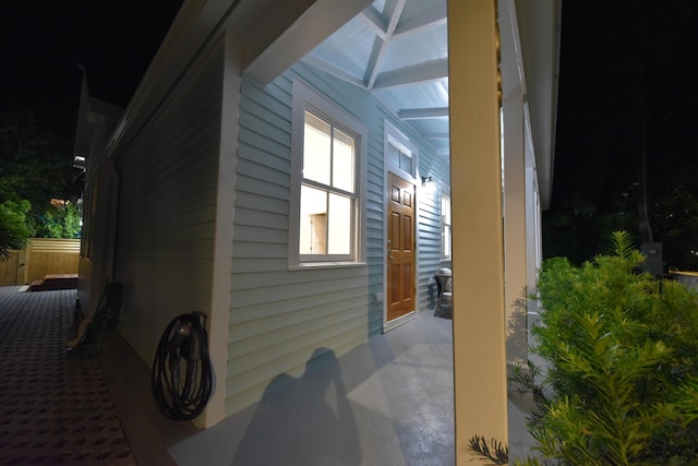 view of property exterior at night
