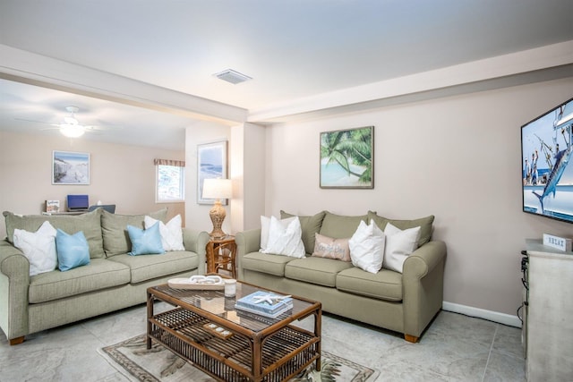 living room featuring ceiling fan