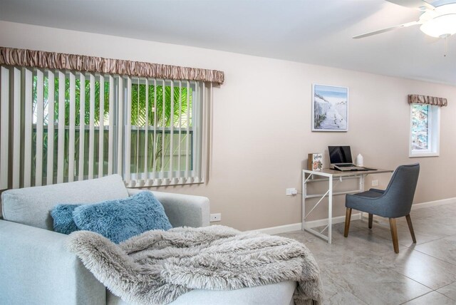 interior space featuring ceiling fan