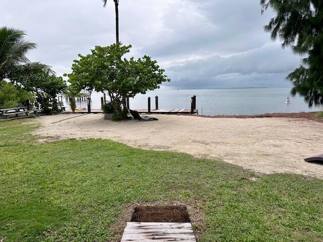 view of yard with a water view