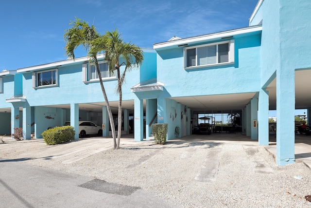 view of front of house featuring a carport