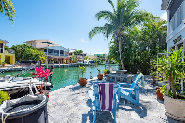 view of patio featuring a water view