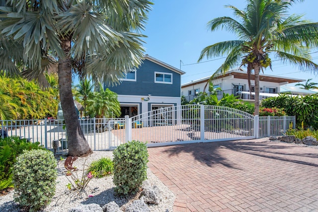 view of front of house featuring a gate and fence