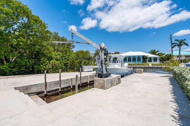 view of home's community featuring a boat dock