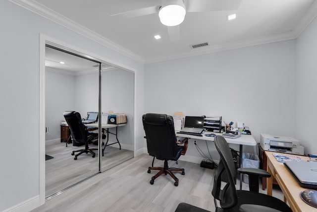 office featuring crown molding, ceiling fan, and light wood-type flooring