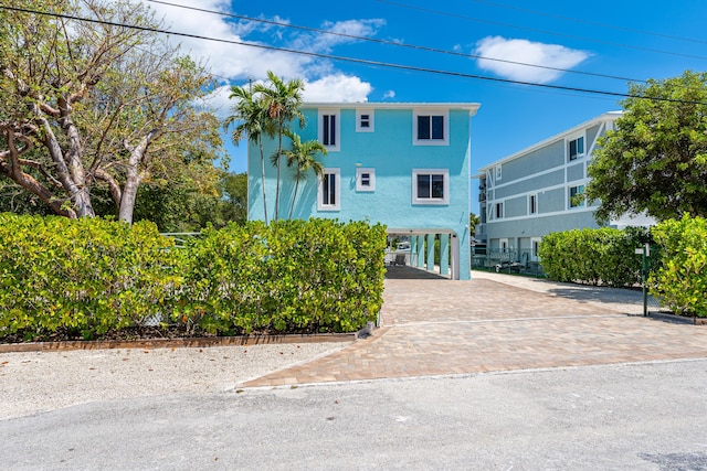 view of front of house featuring a carport