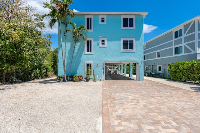 view of front of house with a carport