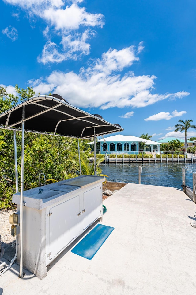 view of dock featuring a water view