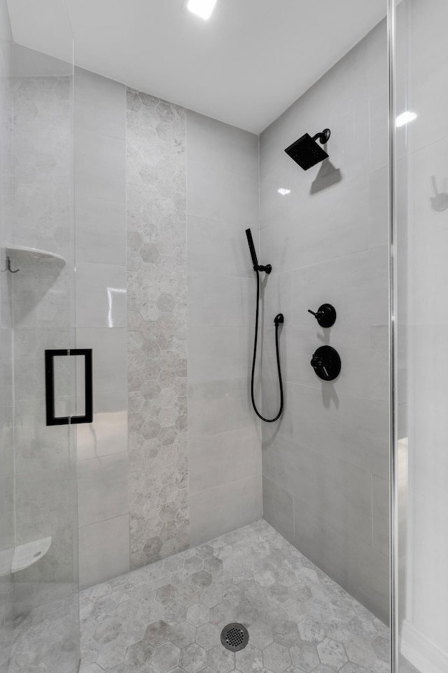 bathroom featuring an enclosed shower