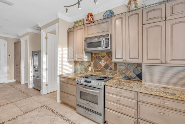 kitchen featuring light tile patterned floors, crown molding, stainless steel appliances, tasteful backsplash, and light stone counters