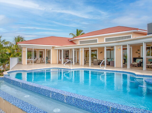 view of swimming pool with a patio area