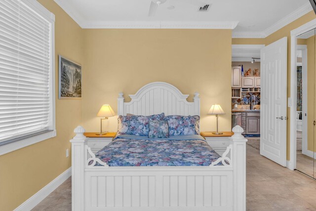 bedroom featuring crown molding