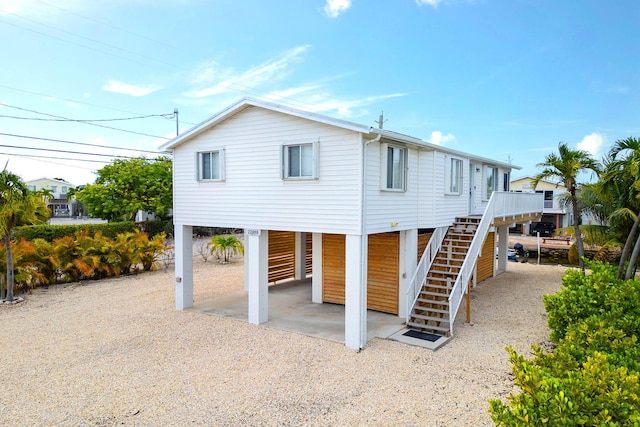 22988 Port Royal Ln, Cudjoe, FL 33042 - back of house with stairway