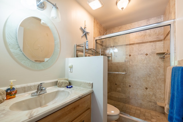 98282 Windward Ave, Key Largo, FL 33037 - bathroom with a stall shower, vanity, visible vents, and toilet