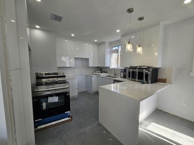 kitchen with a peninsula, visible vents, white cabinets, hanging light fixtures, and stainless steel electric stove