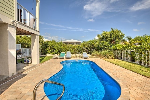 view of pool featuring a patio area