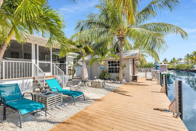 dock area featuring a water view