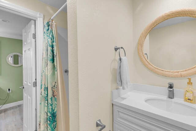 285 Blackbeard Rd, Little Torch, FL 33042 - bathroom with vanity, hardwood / wood-style floors, and curtained shower