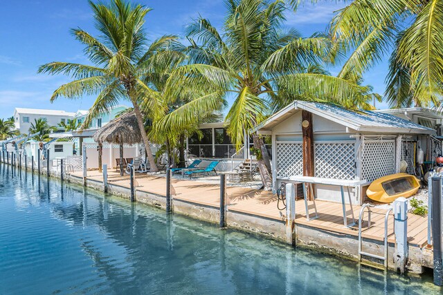 285 Blackbeard Rd, Little Torch, FL 33042 - view of pool with a sunroom, a boat dock, and a water view