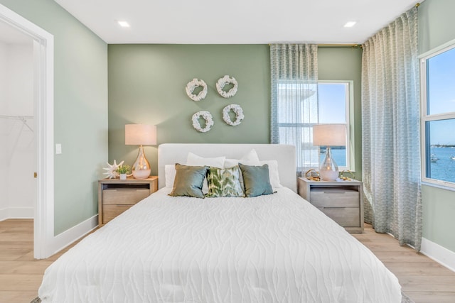 bedroom featuring light wood-type flooring