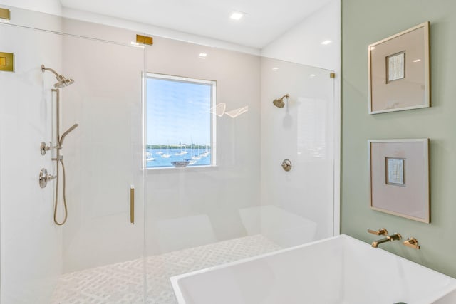 bathroom with sink and shower with separate bathtub