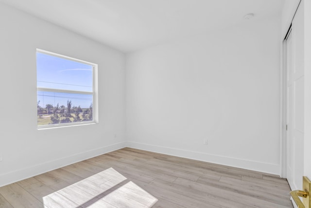 unfurnished room featuring light hardwood / wood-style floors