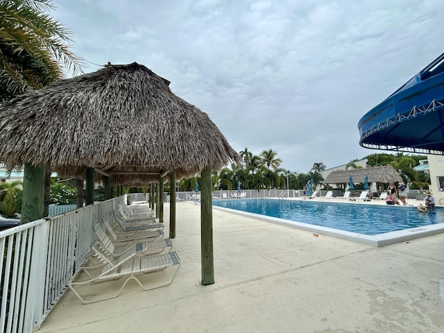 view of pool featuring a gazebo and a patio