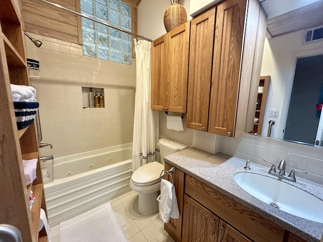 full bathroom featuring shower / tub combo with curtain, tile patterned floors, toilet, vanity, and backsplash