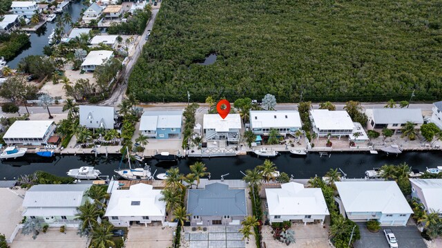 25 N Blackwater Ln, Key Largo, FL 33037 - aerial view of property's location featuring nearby suburban area and a nearby body of water