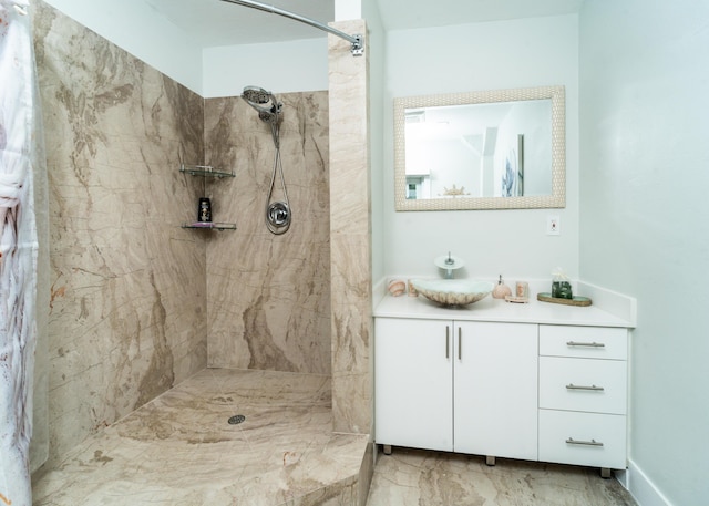 25 N Blackwater Ln, Key Largo, FL 33037 - full bath with tiled shower, vanity, and marble finish flooring