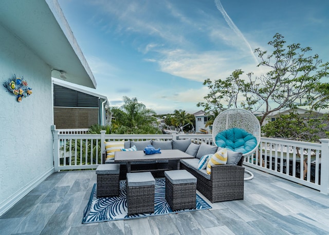 25 N Blackwater Ln, Key Largo, FL 33037 - wooden terrace featuring an outdoor living space