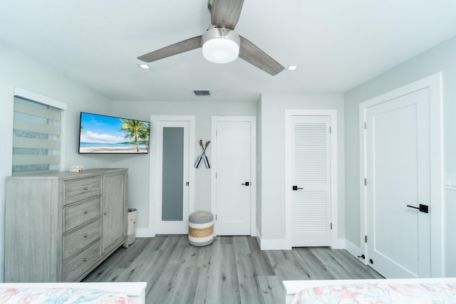 25 N Blackwater Ln, Key Largo, FL 33037 - bedroom with light wood-style floors, baseboards, ceiling fan, two closets, and recessed lighting